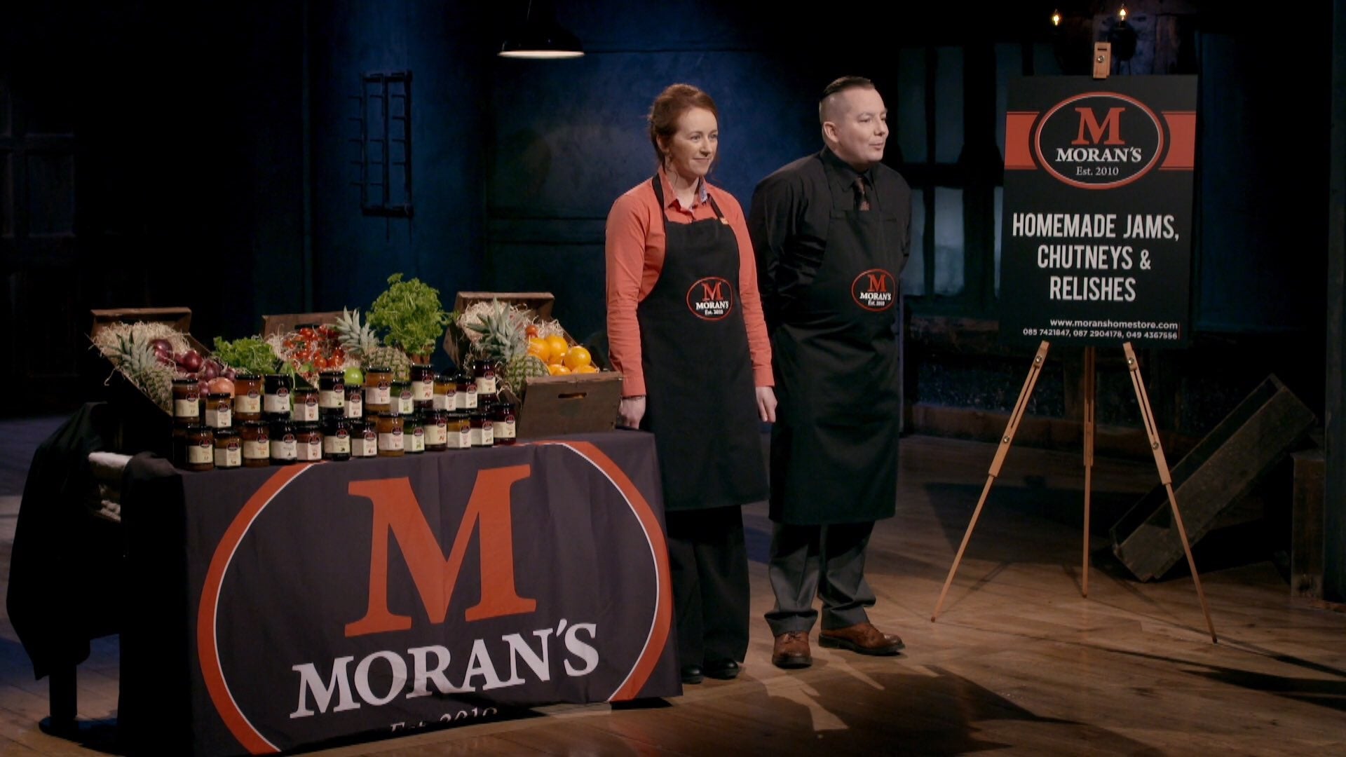 Moran’s Mega Jam team presenting homemade jams, chutneys, and relishes on Dragons’ Den with branded display and product table